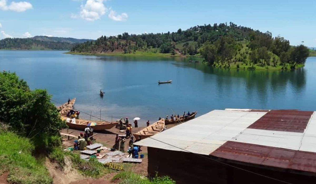 People at a port near Ishywa island in Lake Kivu in Western Province.