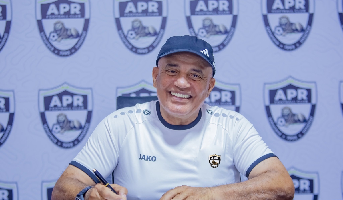 Moroccan tactician Taleb Abderrahim as club’s new head coach signs the deal. Courtesy