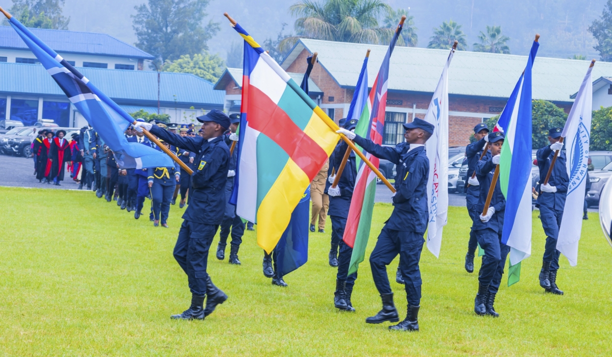 The graduation of 34 law enforcement officers from Rwanda and eight other African countries at the National Police College in Musanze District, June 20. Photos by  Kellya Keza