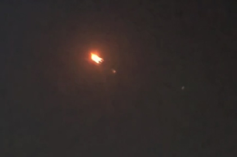 A screen grab taken from a video shows missiles over Doha, Qatar after Iran launched an operation targeting a U.S. base in Qatar on June 23, 2025. [Photo by Anadolou Agency)