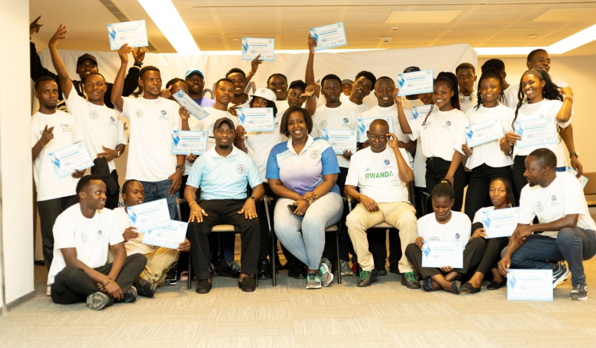 Officials pose with certificates after successfully passing the aquatics officiating clinic-courtesy