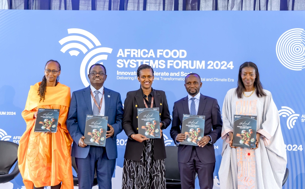 Officials pose for a photo at the launch of Uruhimbi in 2024. They were honoured by the Gourmand Awards with a Special Award for the joint publication Uruhimbi Rwanda’s gastronomy and culinary arts.