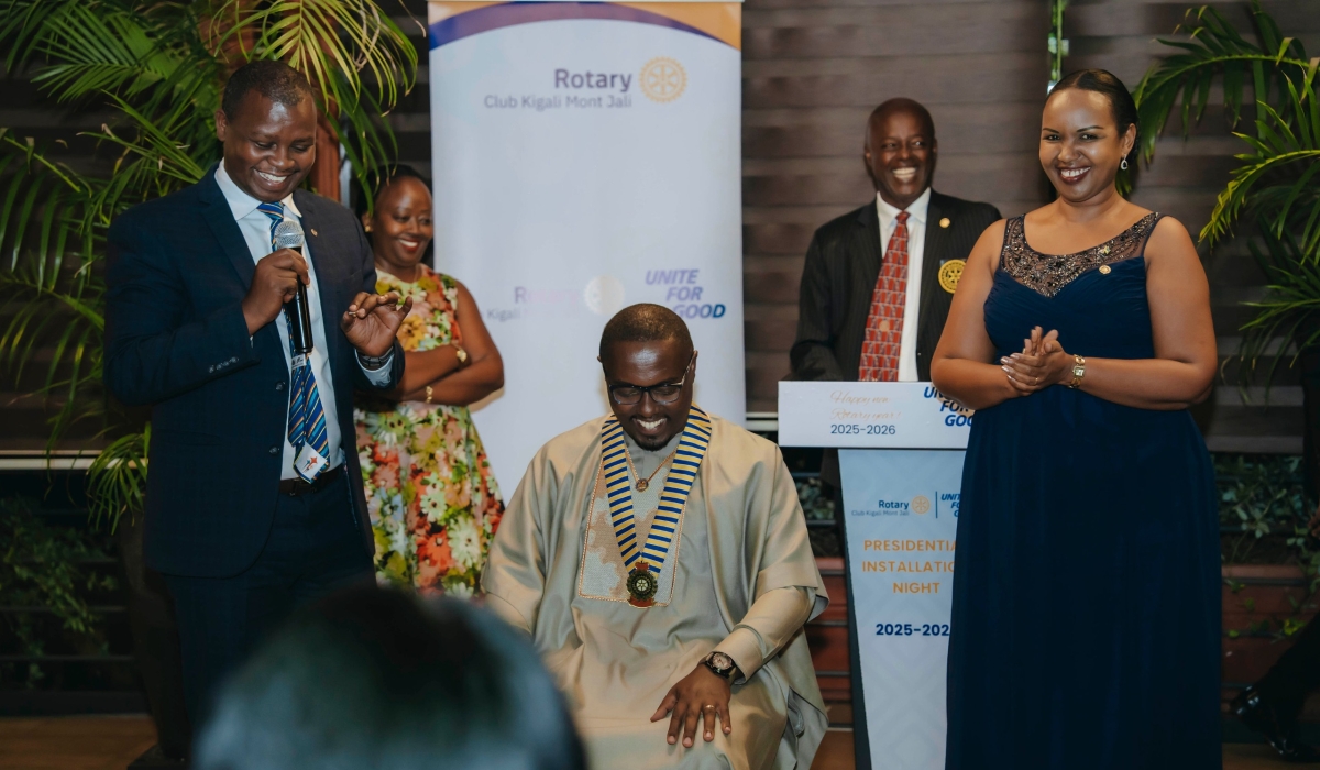 Claver Irakoze installed as the new Rotary Club Kigali Mont Jali by the outgoing president Freddy Mutanguha.