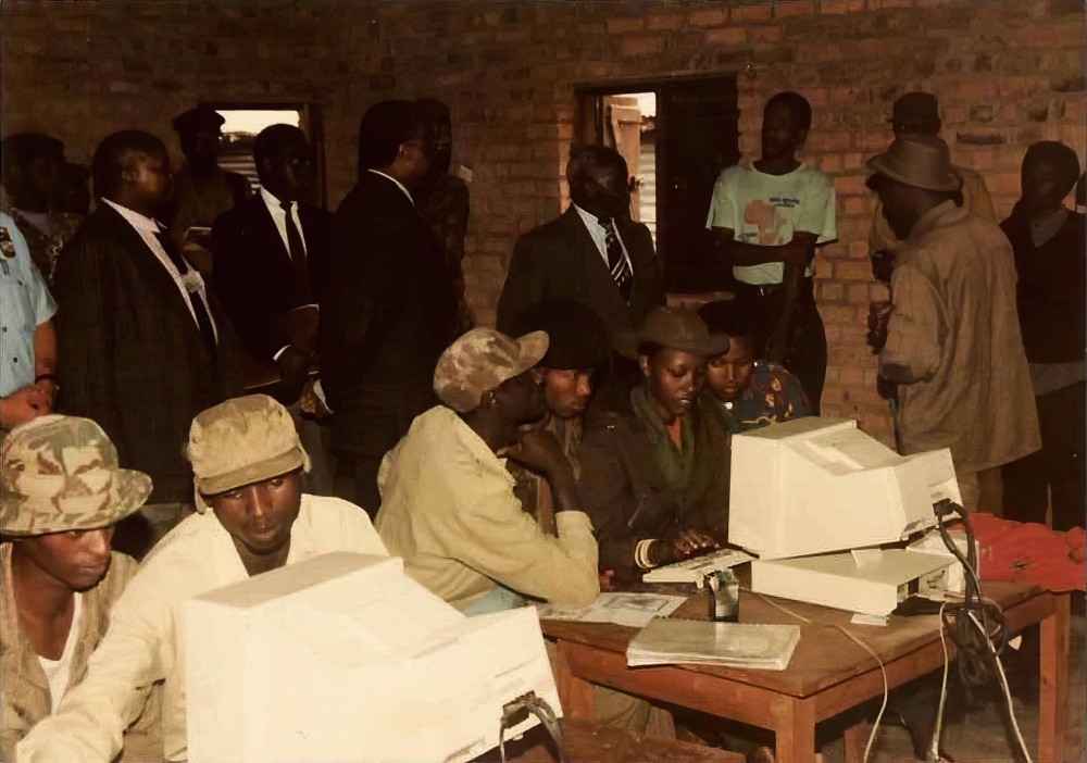Rwanda Patriotic Army fighters register members during the Liberation Struggle in 1990s. Courtesy