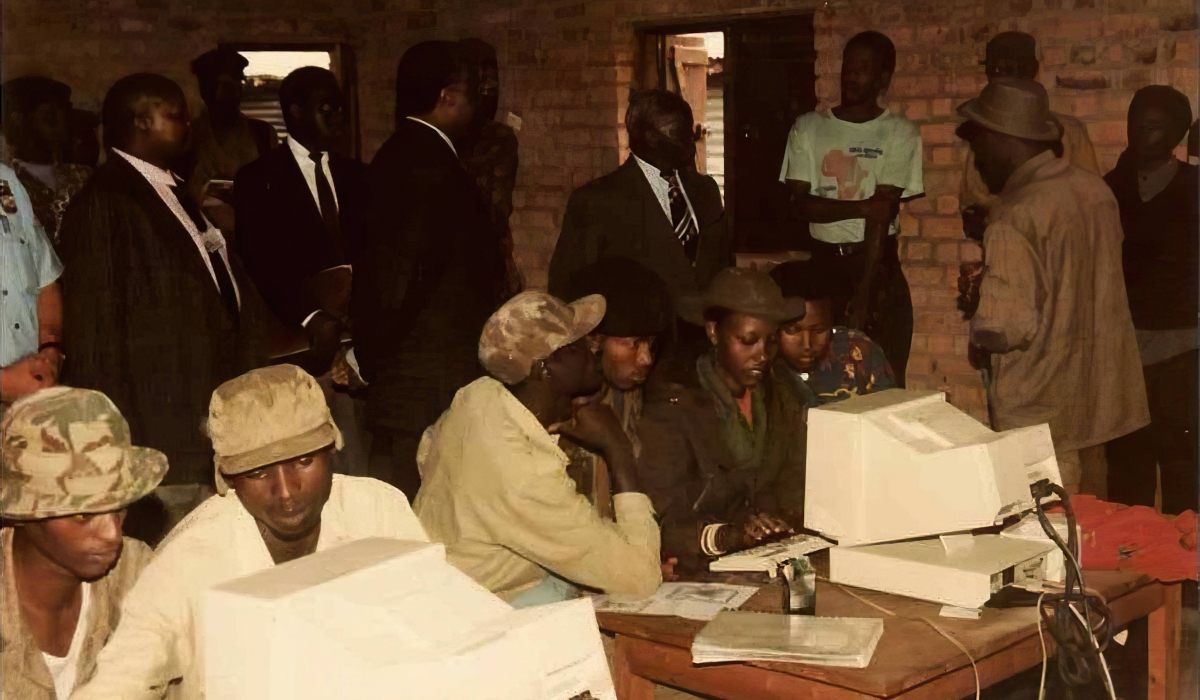 Rwanda Patriotic Army fighters register members during the Liberation Struggle in 1990s. Courtesy