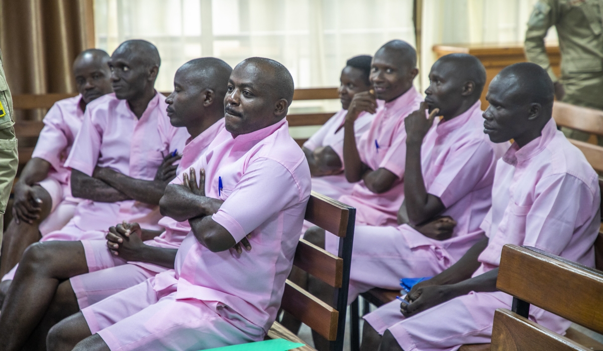 YouTuber Theoneste Nsengimana, the owner of Umubavu TV channel, and his co-accused at the Nyamirambo High Court. Photo by Craish Bahizi
