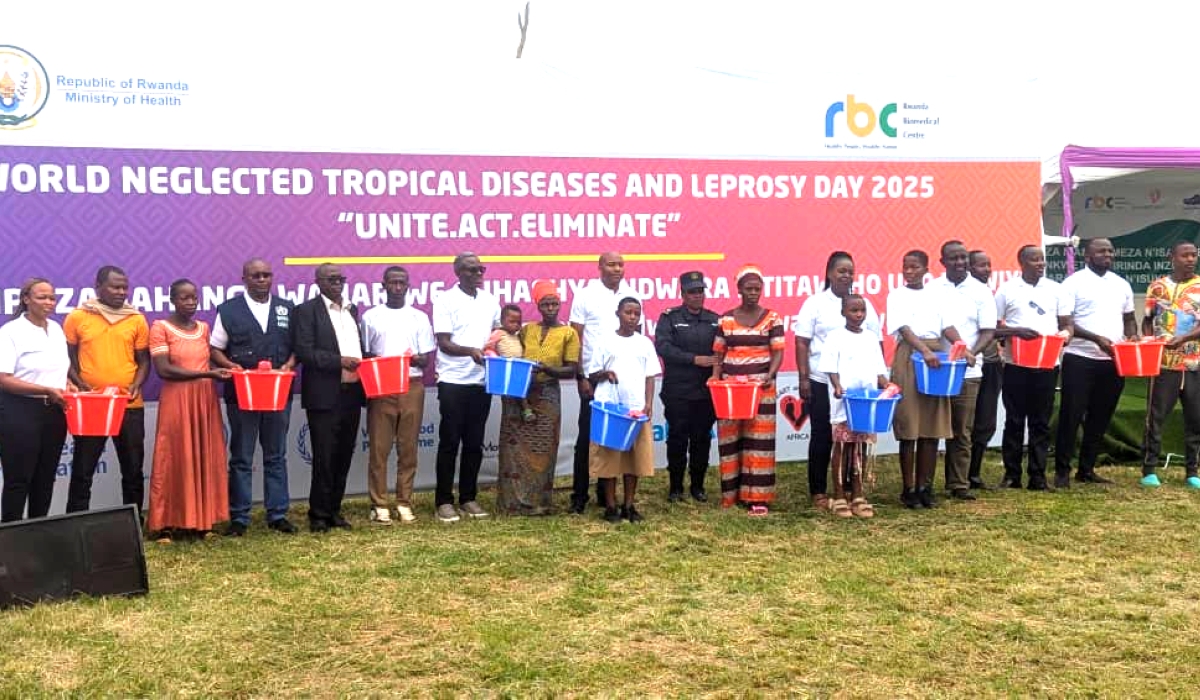 Officials recognize residents and students during the campaign on the neglected tropical diseases in Rwanda