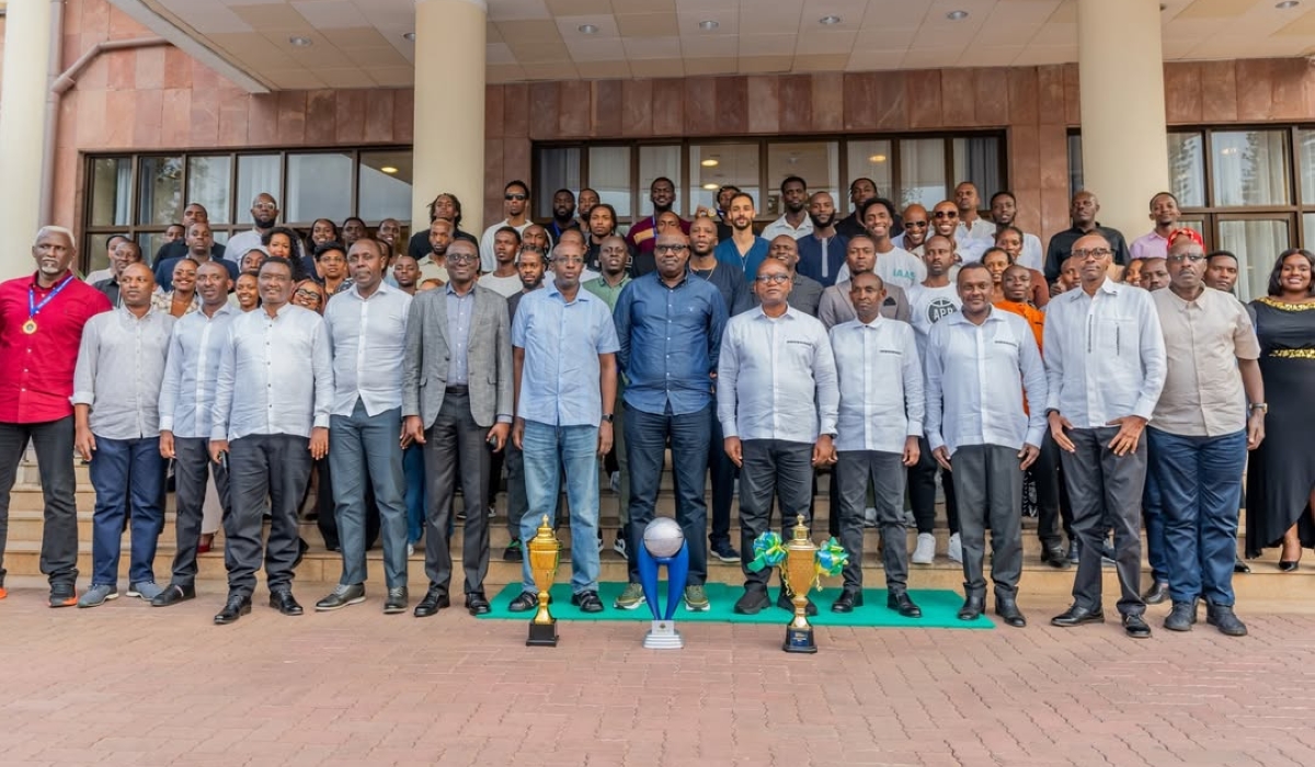 Minister of Defence Juvenal Marizamunda pose for a photo with APR BBC during the club reception at MINADEF and RDF headquarters on Sunday, July 13-courtesy