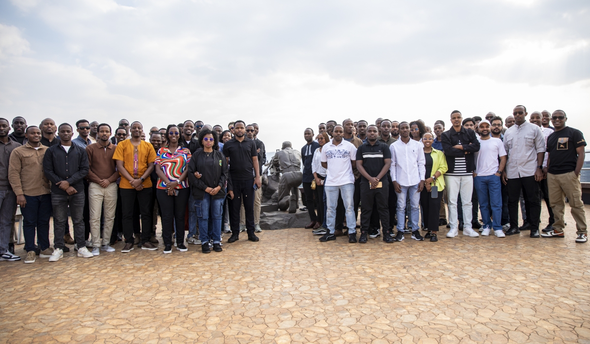 The team from Rwanda-based IT solutions company, QT Global Software Ltd, poses for a group photo during their visit to the Campaign Against Genocide Museum on July 11. Photo by Dan Gatsinzi
