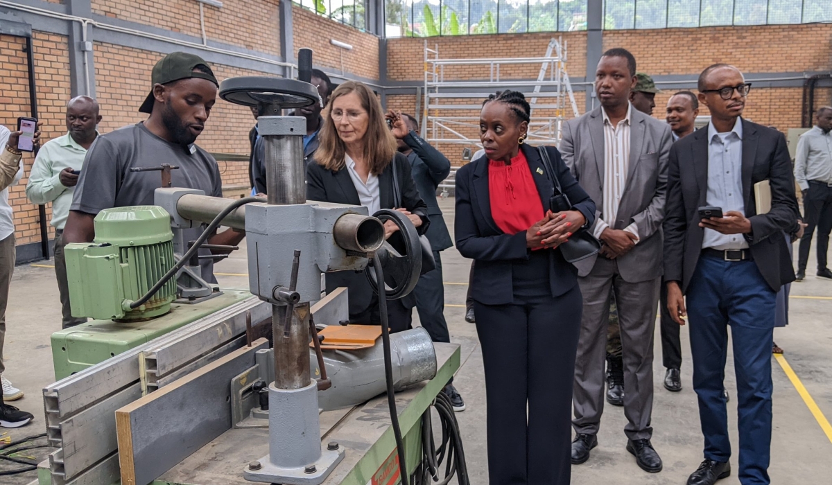 Officials during a guided tour of the MT Wood Tech Solutions factory in Karongi District on Tuesday, July 15. Photo by Germain Nsanzimana. 