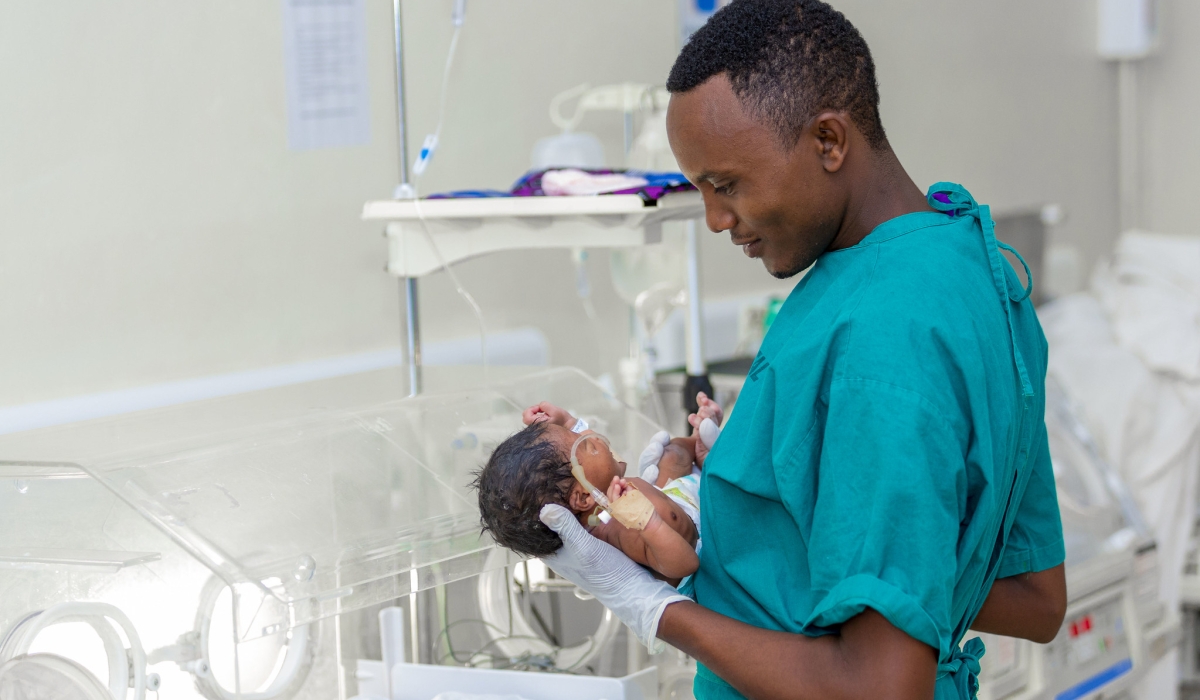 A neonatal health professional attends to a new-born baby at Kirehe District Hospital. In a bid to give more people opportunity to have children, Rwanda has expanded access to surrogacy. Photo by Ministry of Health.