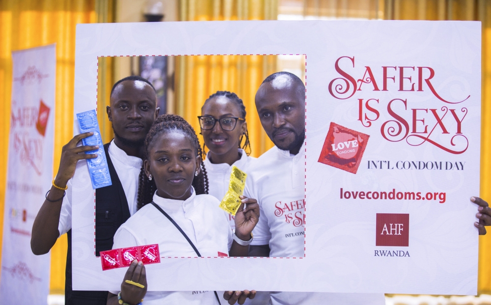 Some people pose for a photo  during a campaign  on preventing transmissible diseases.