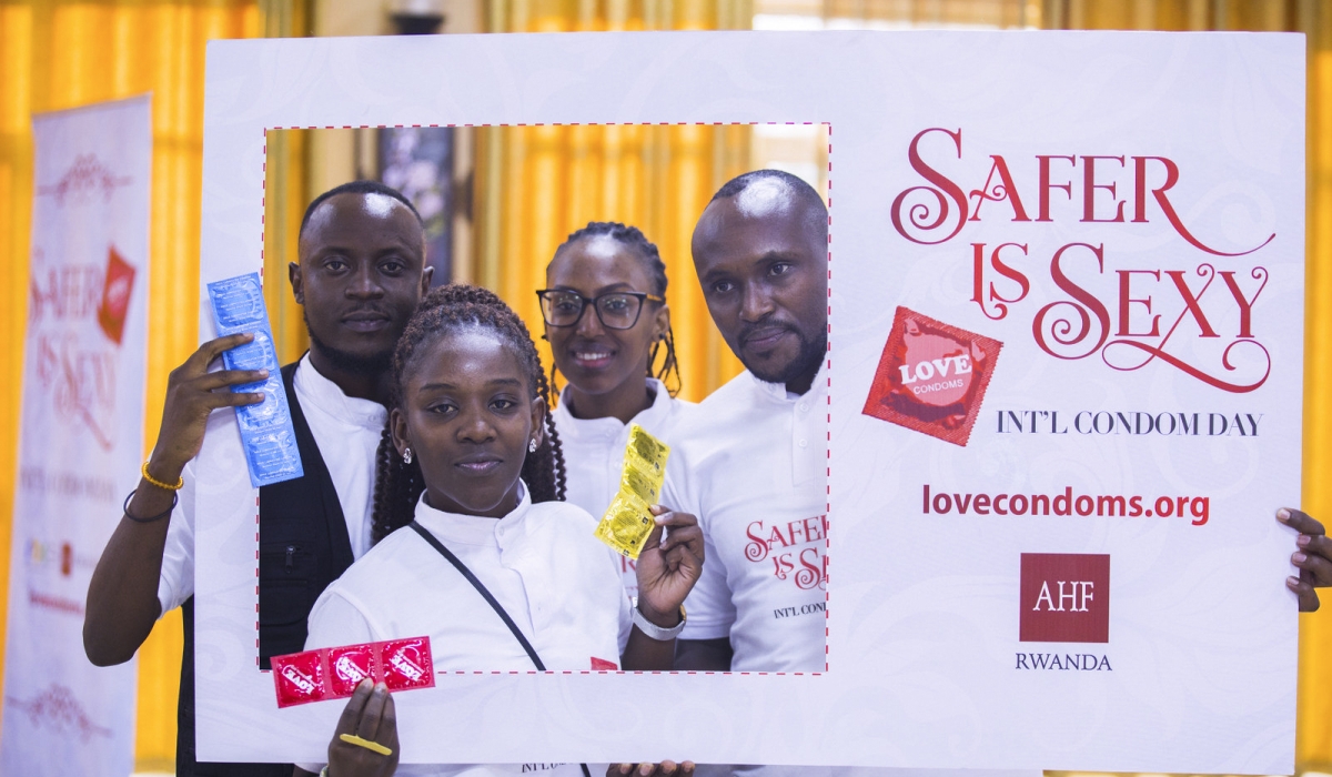 Some people pose for a photo  during a campaign  on preventing transmissible diseases.
