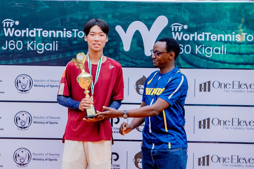 Kazuki Nakajima poses with a trophy after winning first week of ITF World Tennis Junior Tour in Kigali on Saturday, August 9