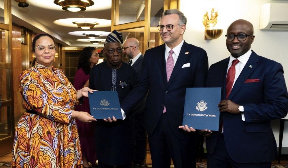 Boulos (2nd from right), poses for a picture with Rwanda&#039;s foreign affairs minister Olivier Nduhungirehe and DR Congo&#039;s Therese Kayikwamba, during earlier stages of the peace talks between both countries.