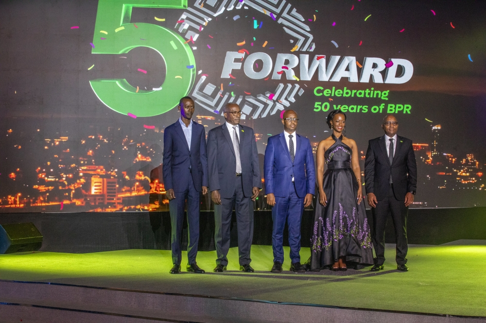 Officials pose for a group photo at the celebration of BPR Rwanda&#039;s 50th anniversary on Friday, August 8 . All photos by Craish Bahizi