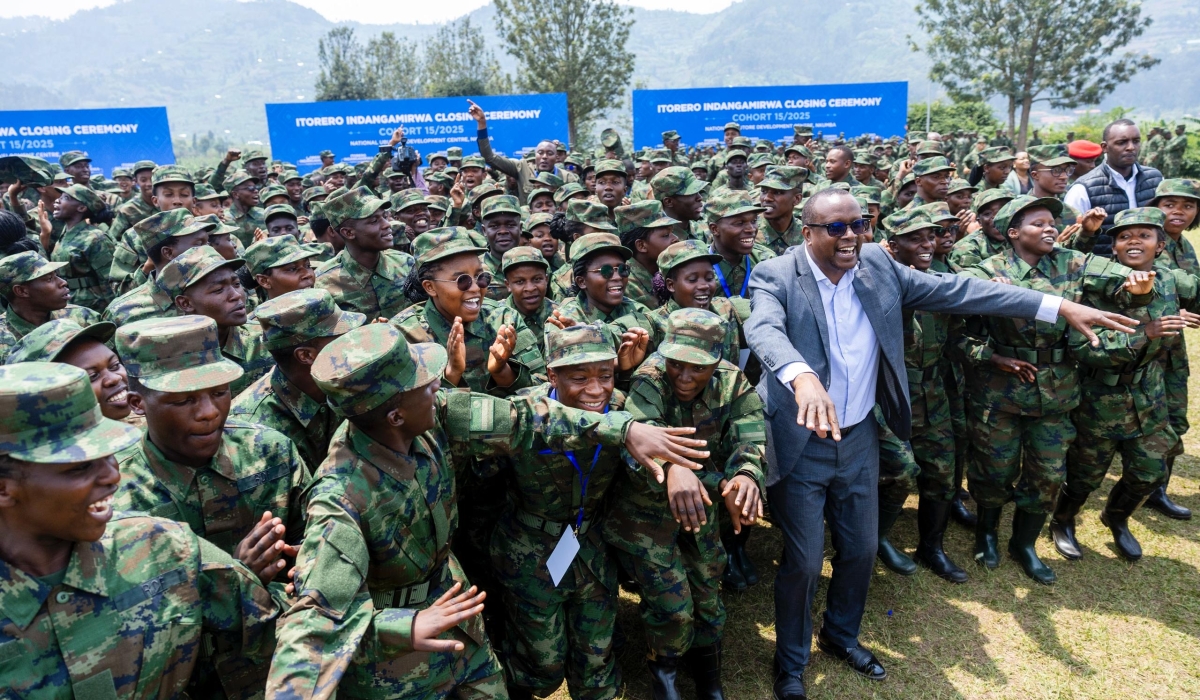 Minister Jean  Damascene  Bizimana joins members of Itorero Indangamirwa during a morale boosting session during the closing ceremony of Itorero Indangamirwa at Nkumba in Burera District on Thursday, August 14. All photos by Olivier Mugwiza