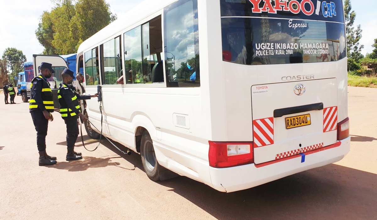 Rwanda National Police traffic officers inspect air pollution of vehicles in Rwamagana District. Rwanda will officially begin the Enhanced Vehicle Emission Testing on Monday, August 25.
