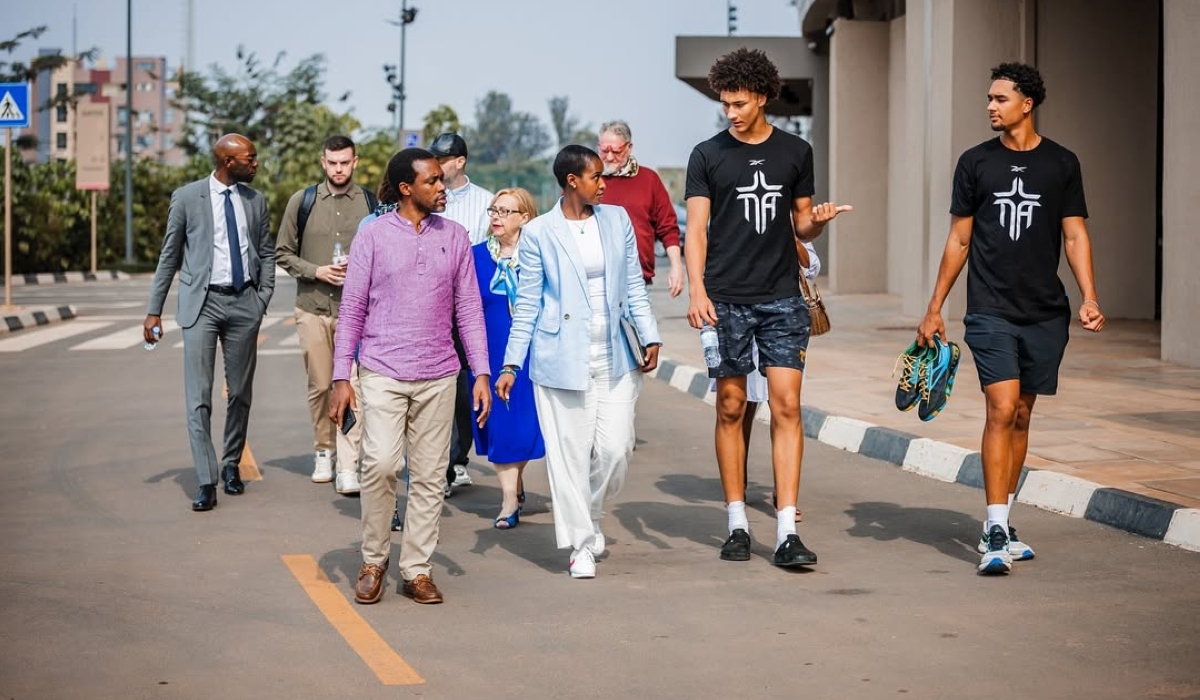 Sports Minister Nelly Mukazayire welcomes 2026 NBA draft prospect Nate Ament to Amahoro Stadium.