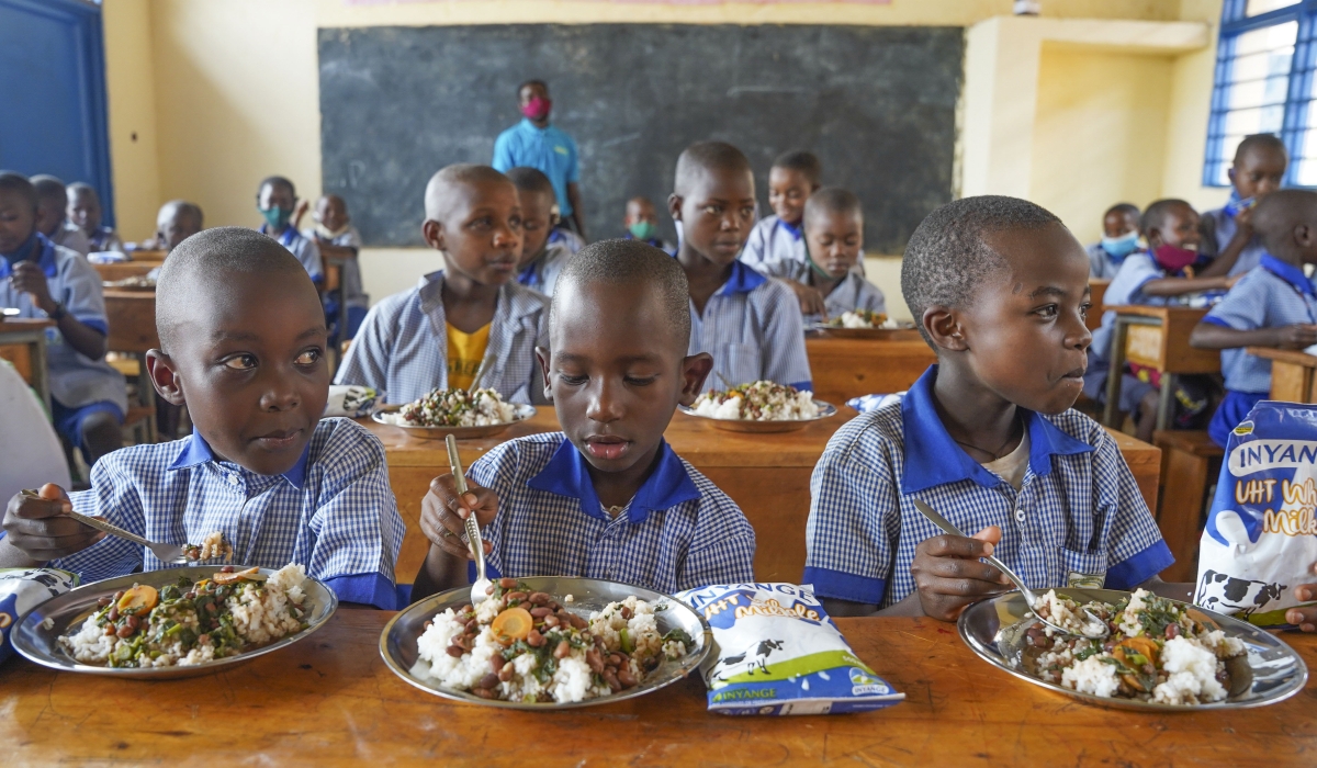 Students have lunch through schoolfeeding programme at Groupe Scolaire Ayabaraya in Kicukiro District   on Monday, February 28, 2023. Craish BAHIZI 