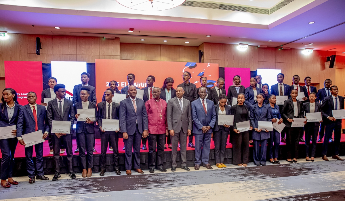 Equity Bank Rwanda officials  and 34 scholars that were sent to top regional and international universities on August 19. Photo by Kellya Keza