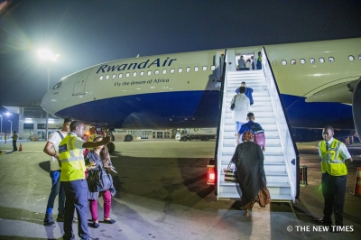 Passengers board RwandAir plane at Kigali International Airport. RwandAir wants to double its passenger numbers from just over 1 million in 2023-2024 to more than 2.1 million by 2028-2029.