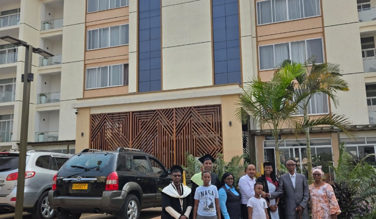 Graduands with their families and staff when they visited Kigali Paramount Hotel. In a blue blouse is Dr. Jane Kanjuru of MKU.