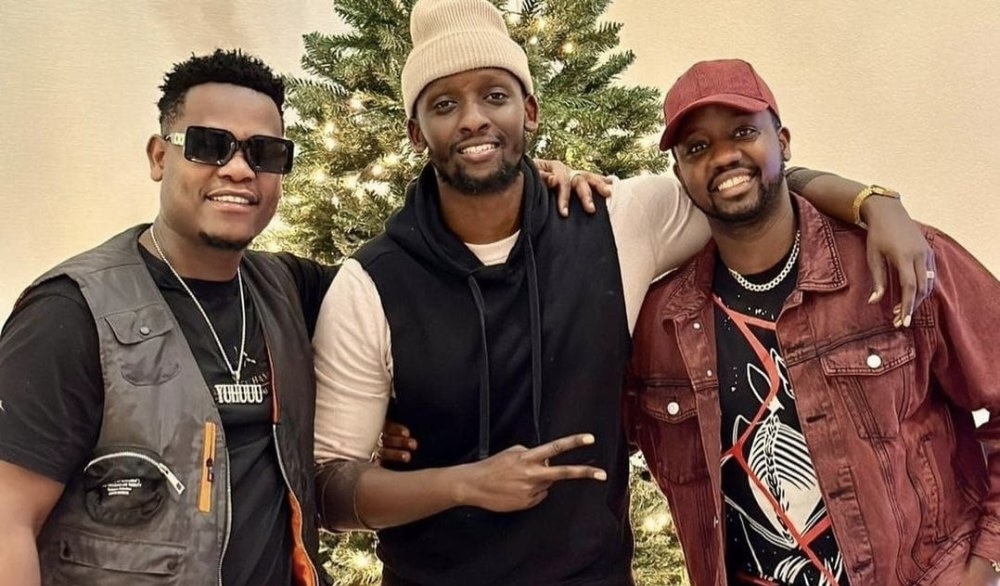 Bruce Melodie, Meddy (C) and Coach Gael