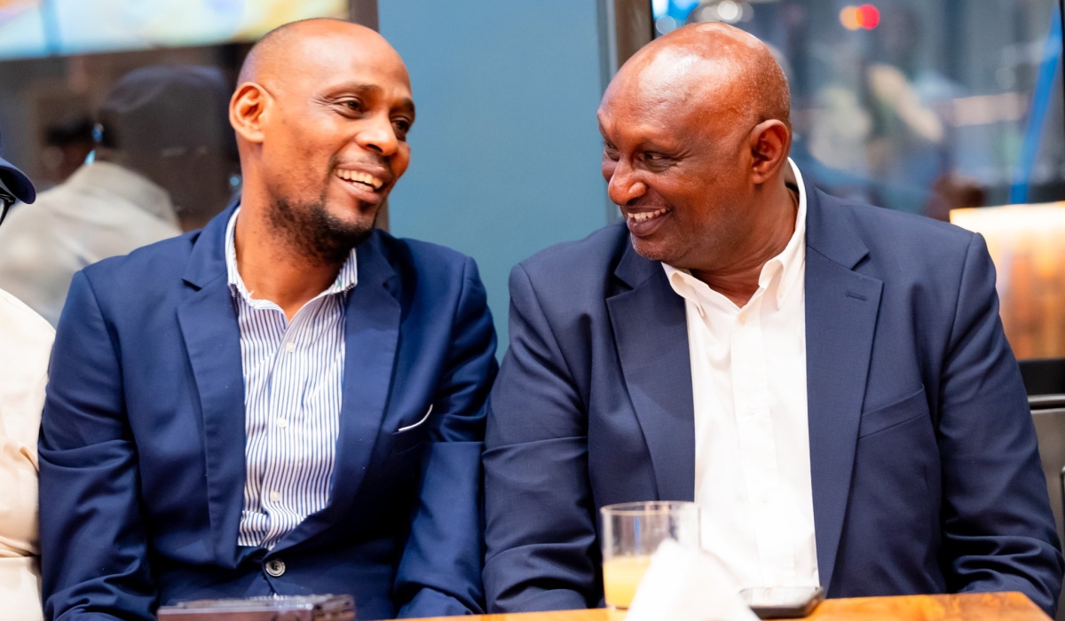 Rayon Sports Association President Thadée Twagirayezu and Paul Muvunyi, Chairman of Rayon Sports’ Supreme Organ interacts at the launch of the online platform. Courtesy