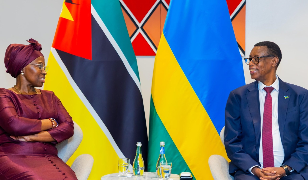 The Minister of State for Regional Cooperation, Gen (Rtd) James Kabarebe, and Mozambican Foreign Minister, Maria Manuela dos Santos Lucas during a meeting in Kigali on Tuesday, August 26. Courtesy