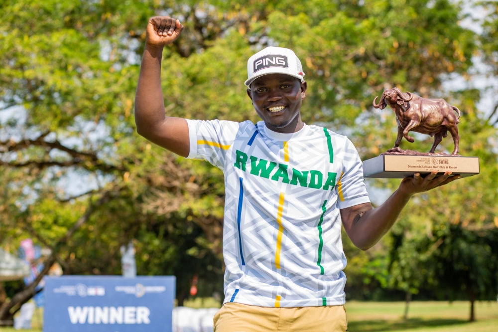 Rwandan pro Nsanzuwera poses with his trophy following his triumph at the SunDev East Africa Johnnie Walker Classic in Diani-min.