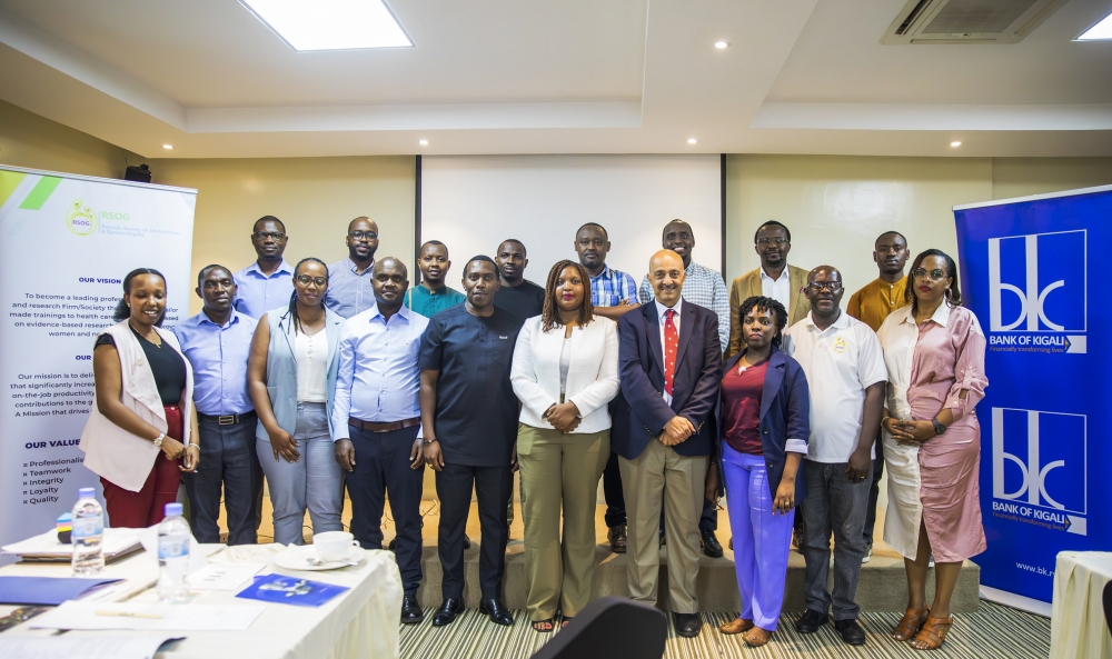 Officials and participants pose for a group photo. Photos by Titus Manzi