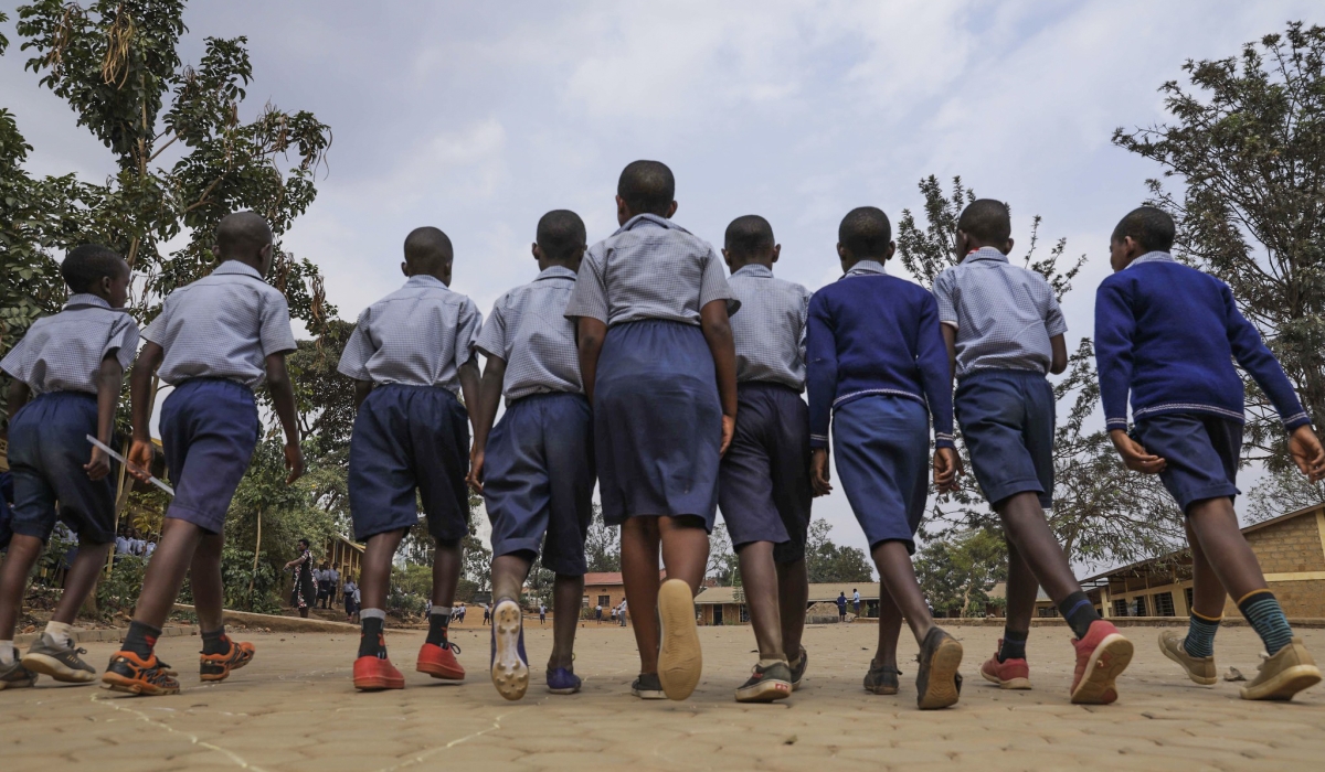 Students walk around at Group Scolaire Rugando. Craish Bahizi