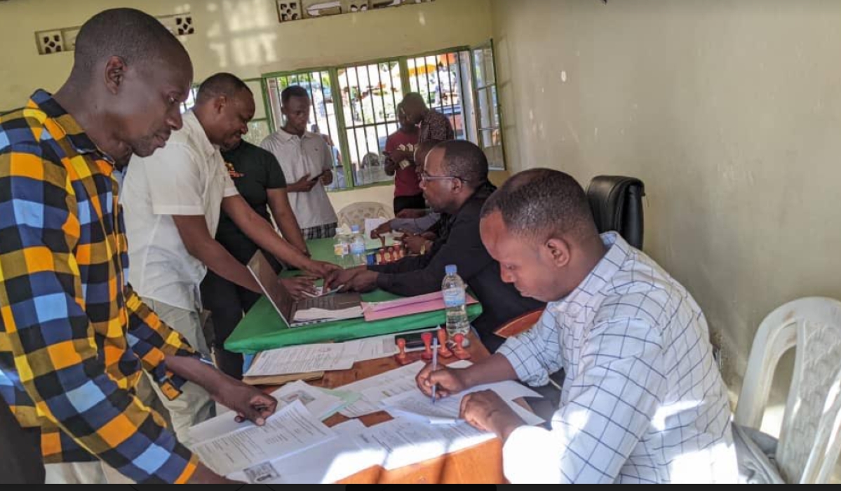 Residents during a correction session of their land titles. Courtesy