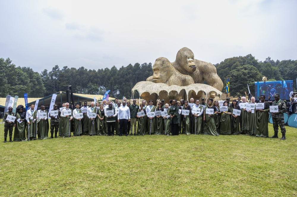 Prime Minister Justin Nsengiyumva and the namers pose for a family photo at Kwita Izina ceremony in Kinigi, Musanze District, on Friday, September 5. Photo by Olivier Mugwiza