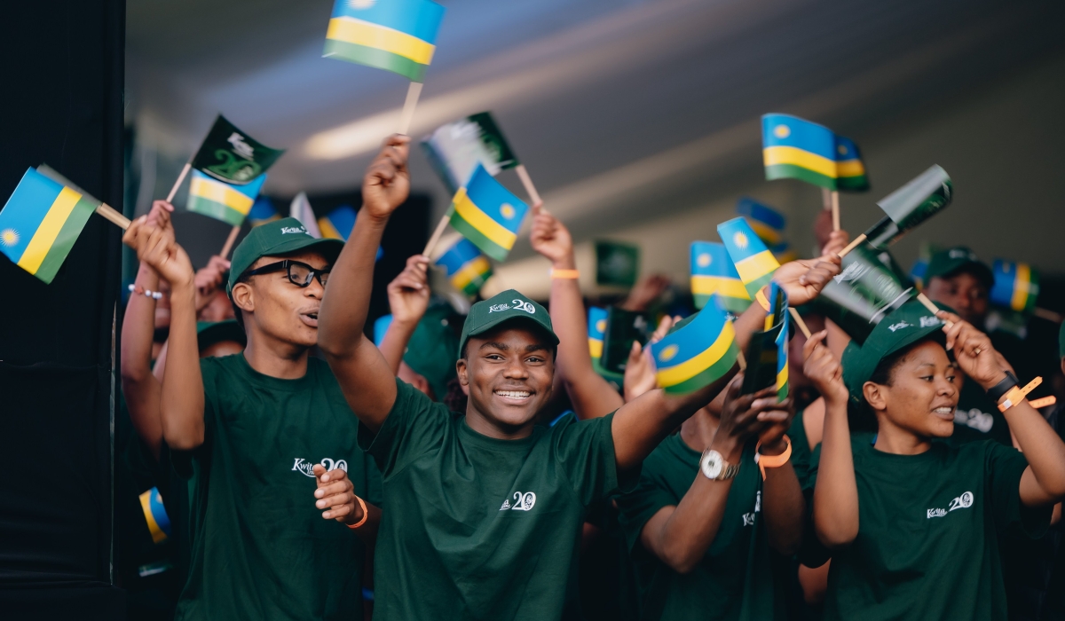 Participants at Kwita Izina ceremony wave Rwandan flags ahead of the main event on Friday, September 5. Courtesy