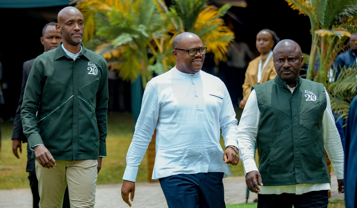 Prime Minister Justin Nsengiyumva (c) arrives in Kinigi for  Kwita Izina ceremony accompanied by RDB CEO Jean Guy Afrika and the Governor of North Province  Maurice Mugabowagahunde.