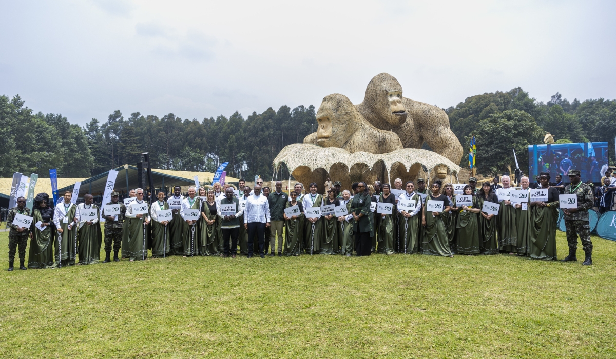 Prime Minister Justin Nsengiyumva and the namers pose for a family photo at Kwita Izina ceremony in Kinigi, Musanze District, on Friday, September 5. Photo by Olivier Mugwiza