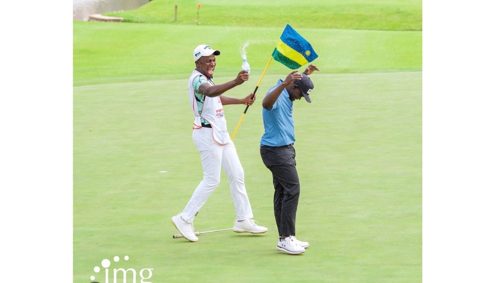 Rwandan golf star Celestine Nsanzuwera is joined by a fellow golfer in celebration of the SportsBiz Africa Golf Championship in Kigali-courtesy photos