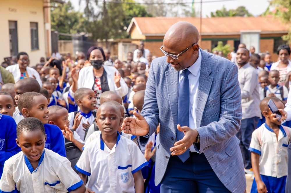Education minister Joseph Nsengimana interacts with young learners at GS Kicukiro in the capital Kigali as schools across the country reopened for the 2025/26 academic year on Monday, September 8. 