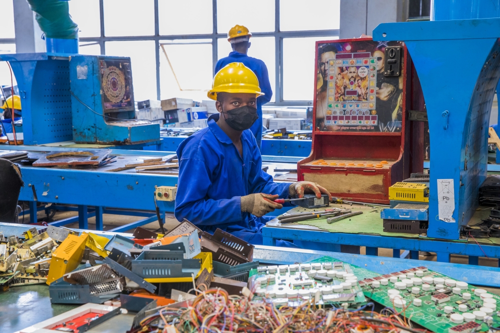 Workers sort some unlicenced machines