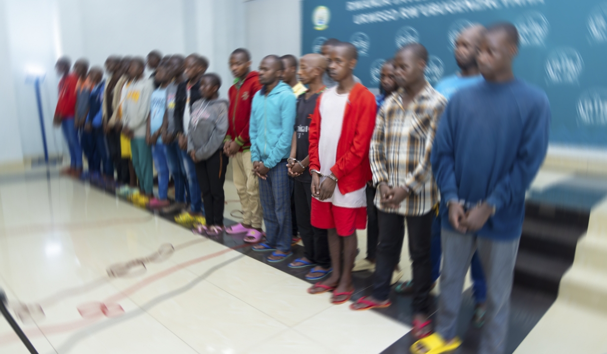 Rwanda Investigation Bureau (RIB) paraded 26 people suspected of engaging in fraudulent schemes targeting mobile money users , on Monday, September 8. Courtesy
