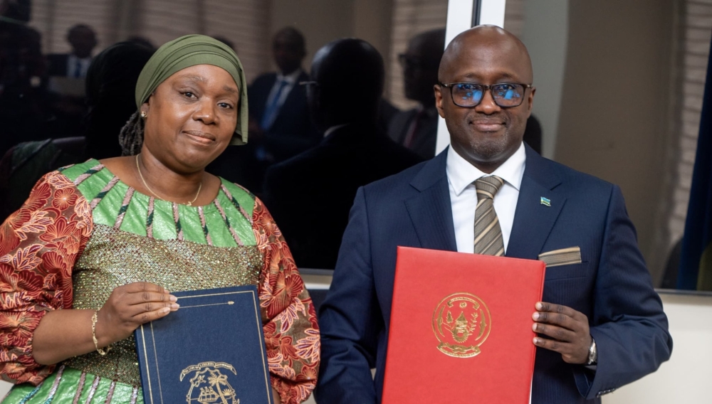 Minister of Foreign Affairs Olivier Nduhungirehe and his Liberian counterpart  Sara Beysolow Nyanti  during the signing event on Wednesday, September 10. Courtesy
