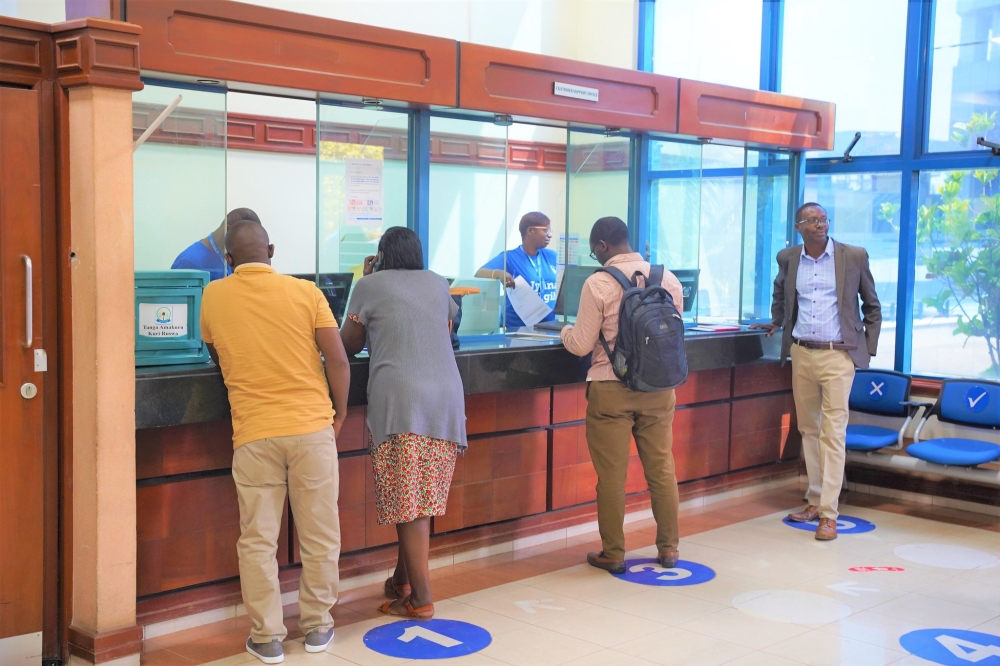 Clients wait to be served at a bank in Kigali. Photo by Craish Bahizi