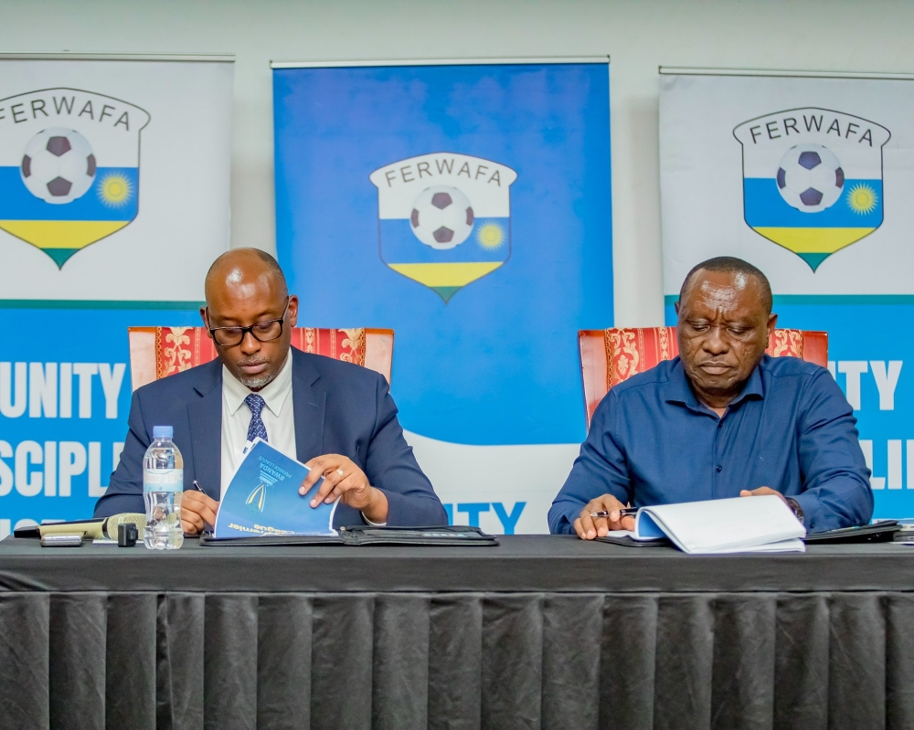 FERWAFA President Shema Ngoga Fabrice and RPL President Al Hadji Yussuf Mudaheranwa signed the Premier League regulations on September 11.