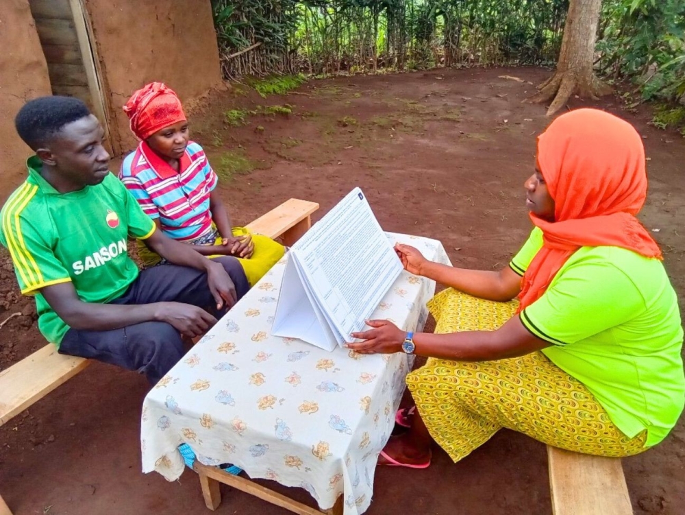Outreach Group initiative visiting a household.