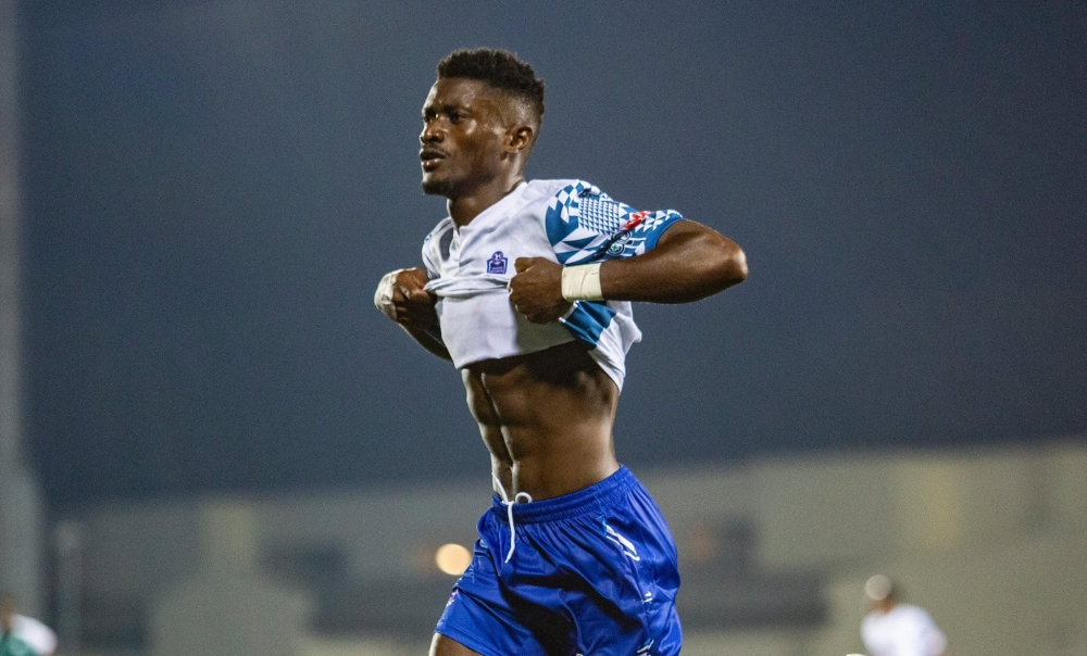 Striker Asman Ndayishimiye celebrates his second goal during Rayon Sports&#039; 2-0 win over Kiyovu SC on Saturday at Kigali Pele Stadium.