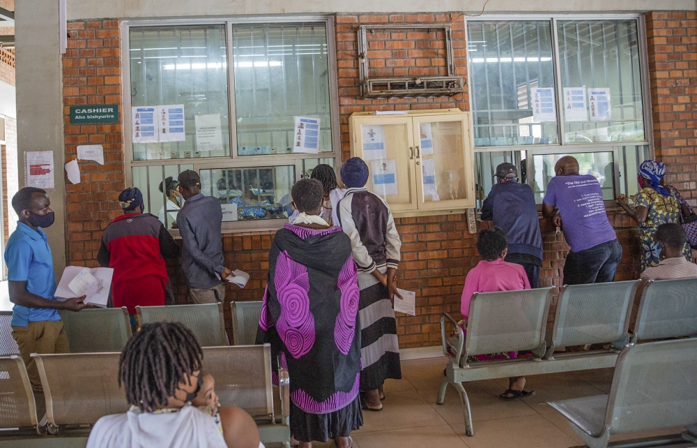Patients and their guardians pay for services at Masaka Hospital in Kicukiro. Photo by Craish Bahizi