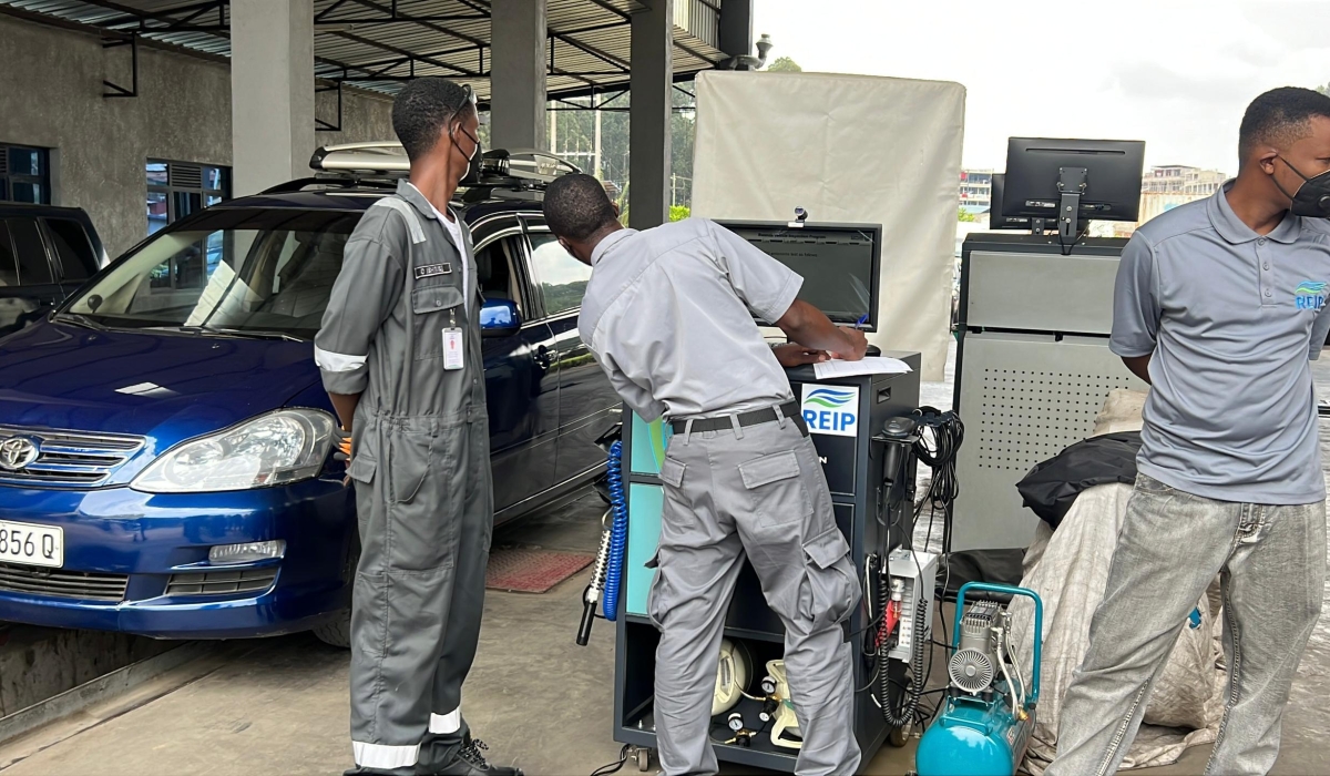 Technicians during vehicle emission testing in Musanze District. Courtesy