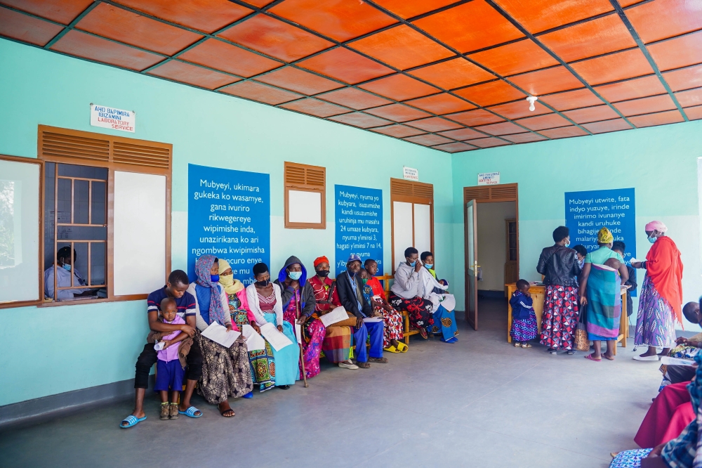 Patients wait for medical services at a health post in Burera District. File